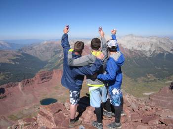 Ryan, Jeff and I raising a beer towards the ridge that took Rob's life