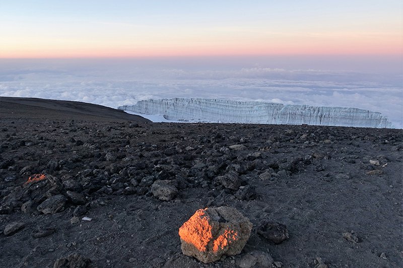 Kilimanjaro summit rock, glacier, and clouds