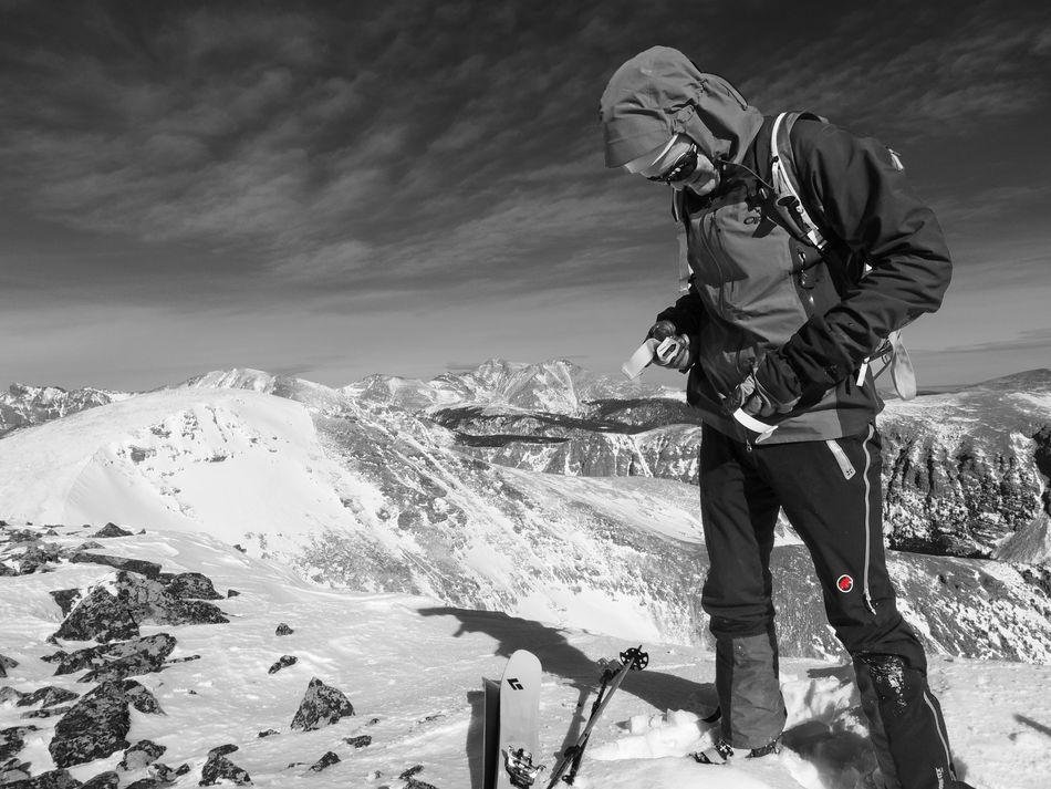 Chuck prepping to ski off Sawtooth Peak