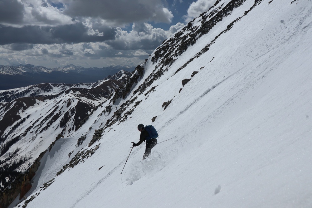 Mike skiing down his final 13er